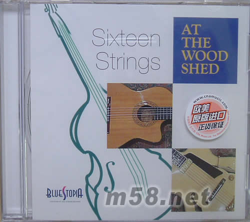 AT THE WOOD SHED專輯正面圖片